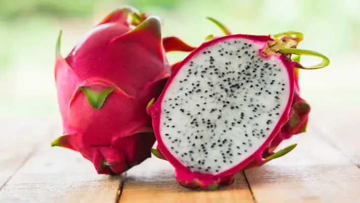 A sliced red dragon fruit